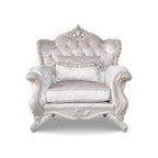 Fauteuil traditionnel avec dossier capitonné et coussin décoratif